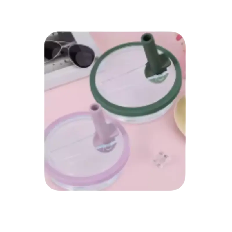 Wine bottle chiller rings in pink and green colors.