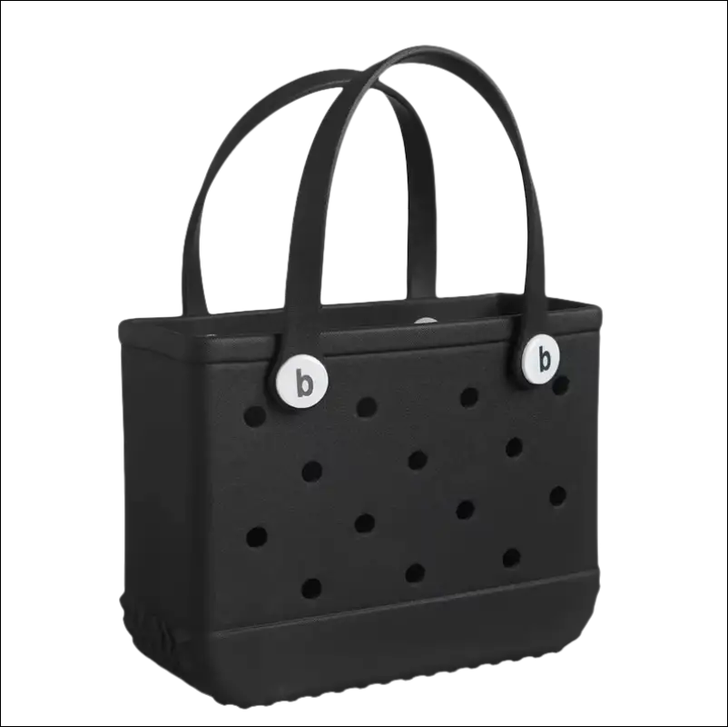 Black perforated handbag with two handles and circular white accents.