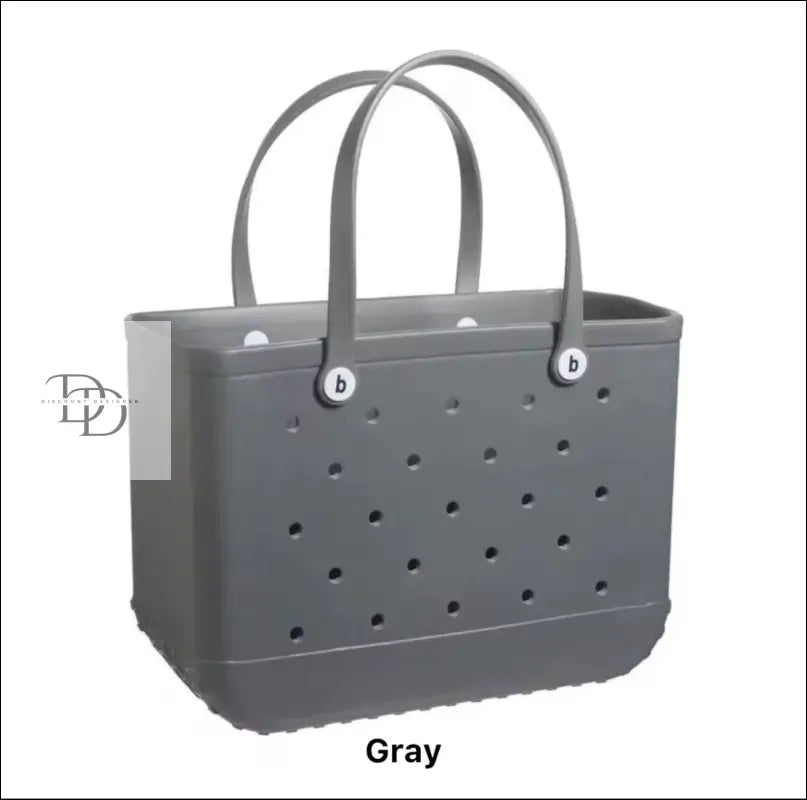 Gray tote bag with holes.