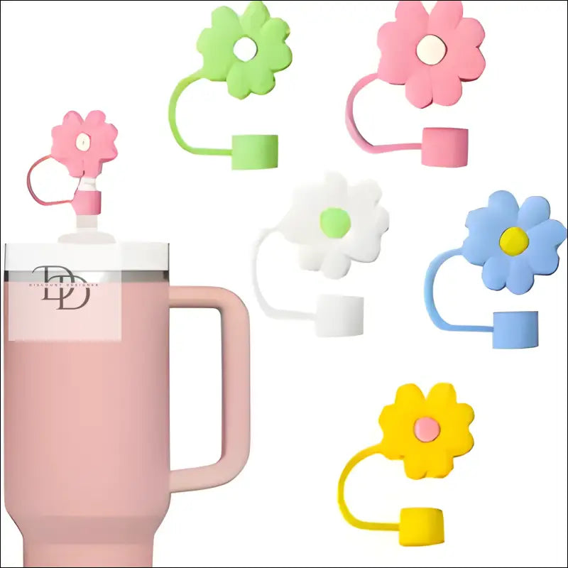 Pink insulated travel mug with a flower-shaped lid attachment.