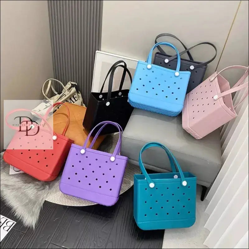 Colorful collection of handbags with perforated designs.